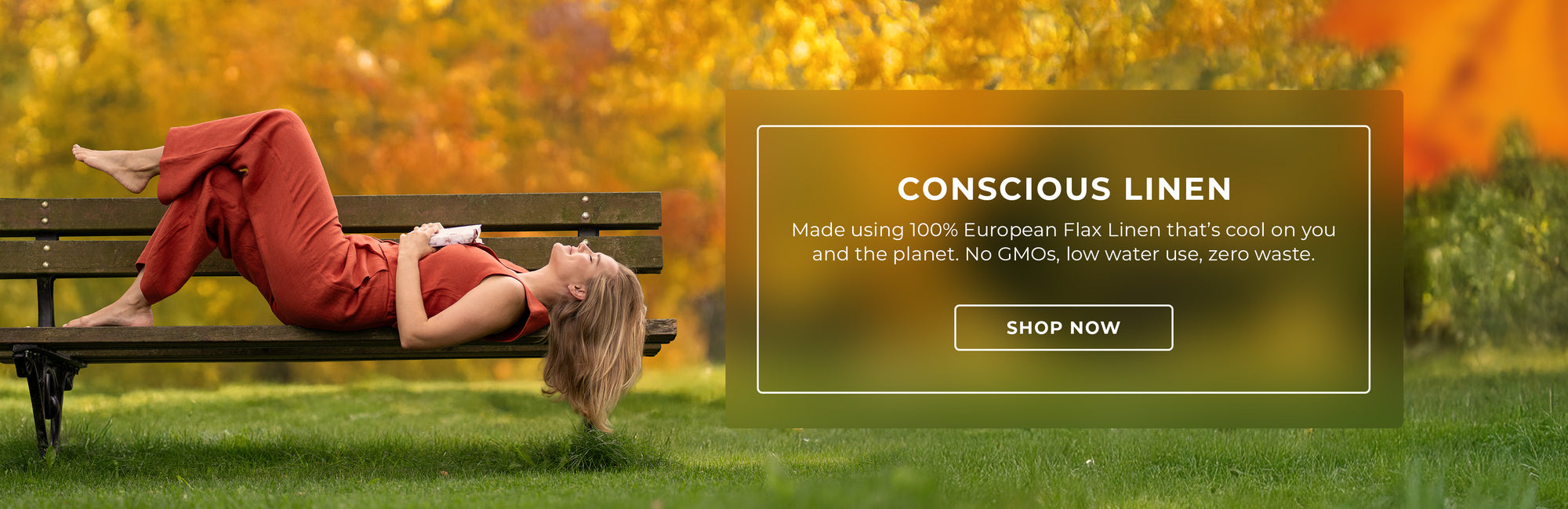 Woman in a red dress lying on a bench with a promotional banner for conscious linen.