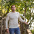 Man running outdoors on a blurred natural background