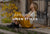 Woman sitting on steps outdoors with text overlay 'Transitional Linen Styles'.